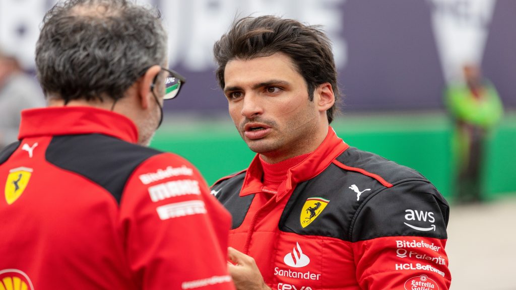 Carlos Sainz of Spain and Scuderia Ferrari speaks with his